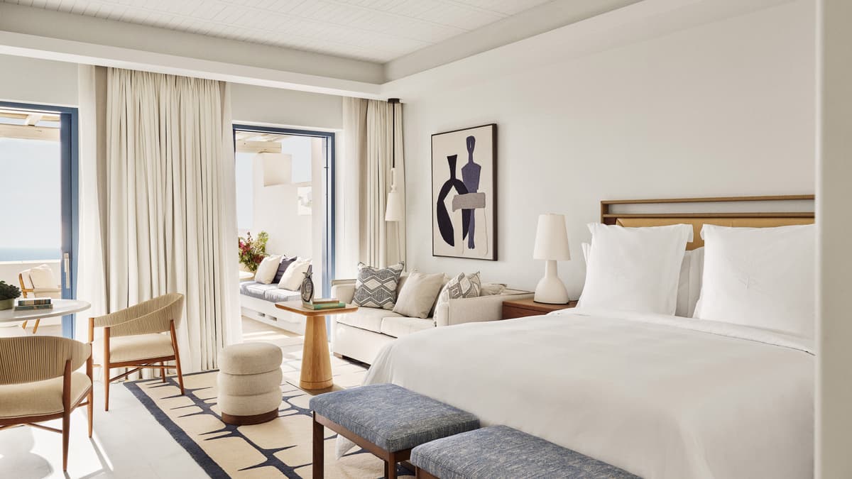 Light-filled guest room at Four Seasons Hotel Mykonos