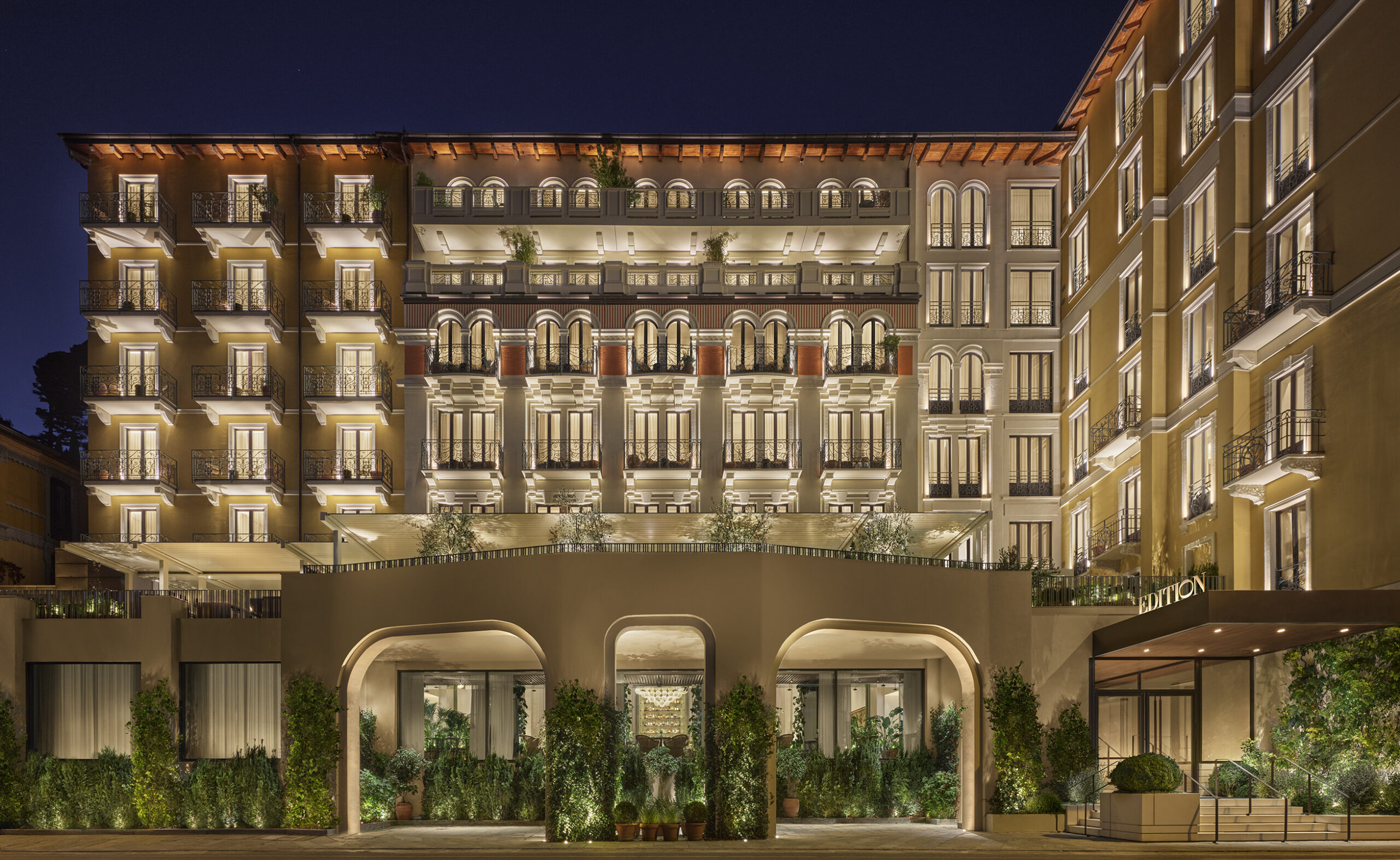 Illuminated facade of The Lake Como EDITION