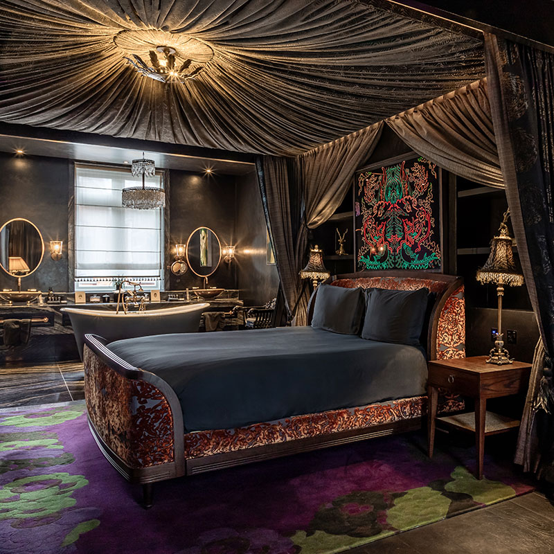 Dark velvet canopy suite at The Mandrake London