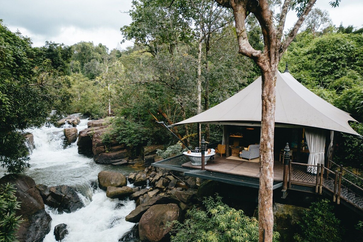 Luxury tent above a waterfall at Shinta Mani Wild