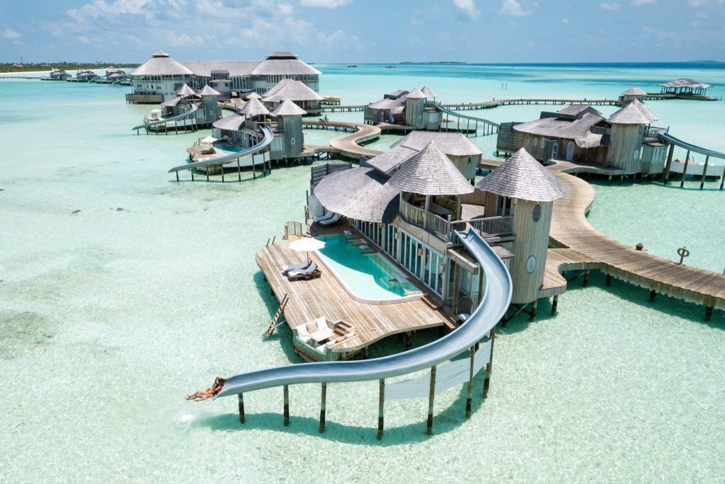 Overwater villa with waterslide at Soneva Jani